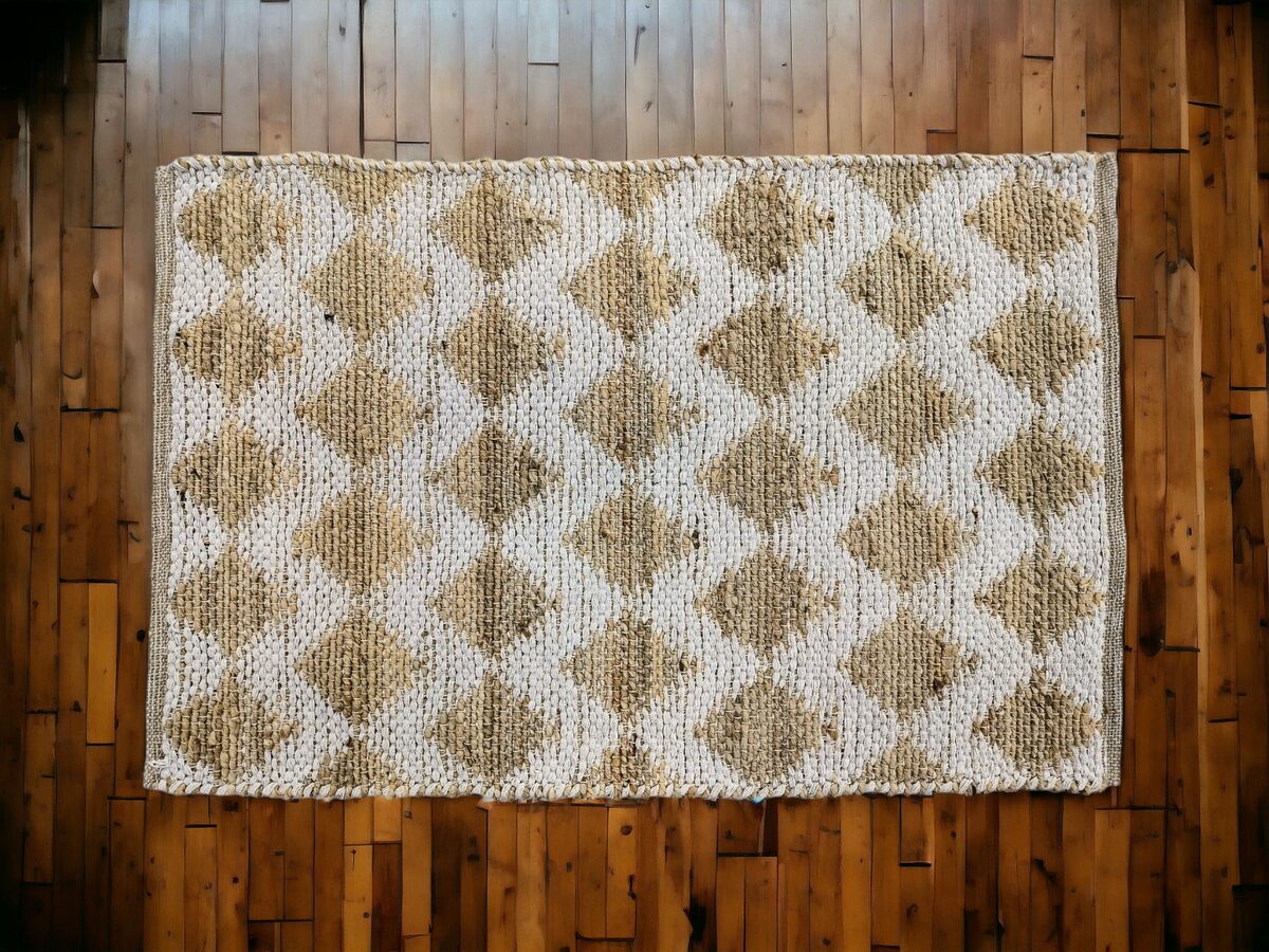 Cream rug with woven diamond motifs