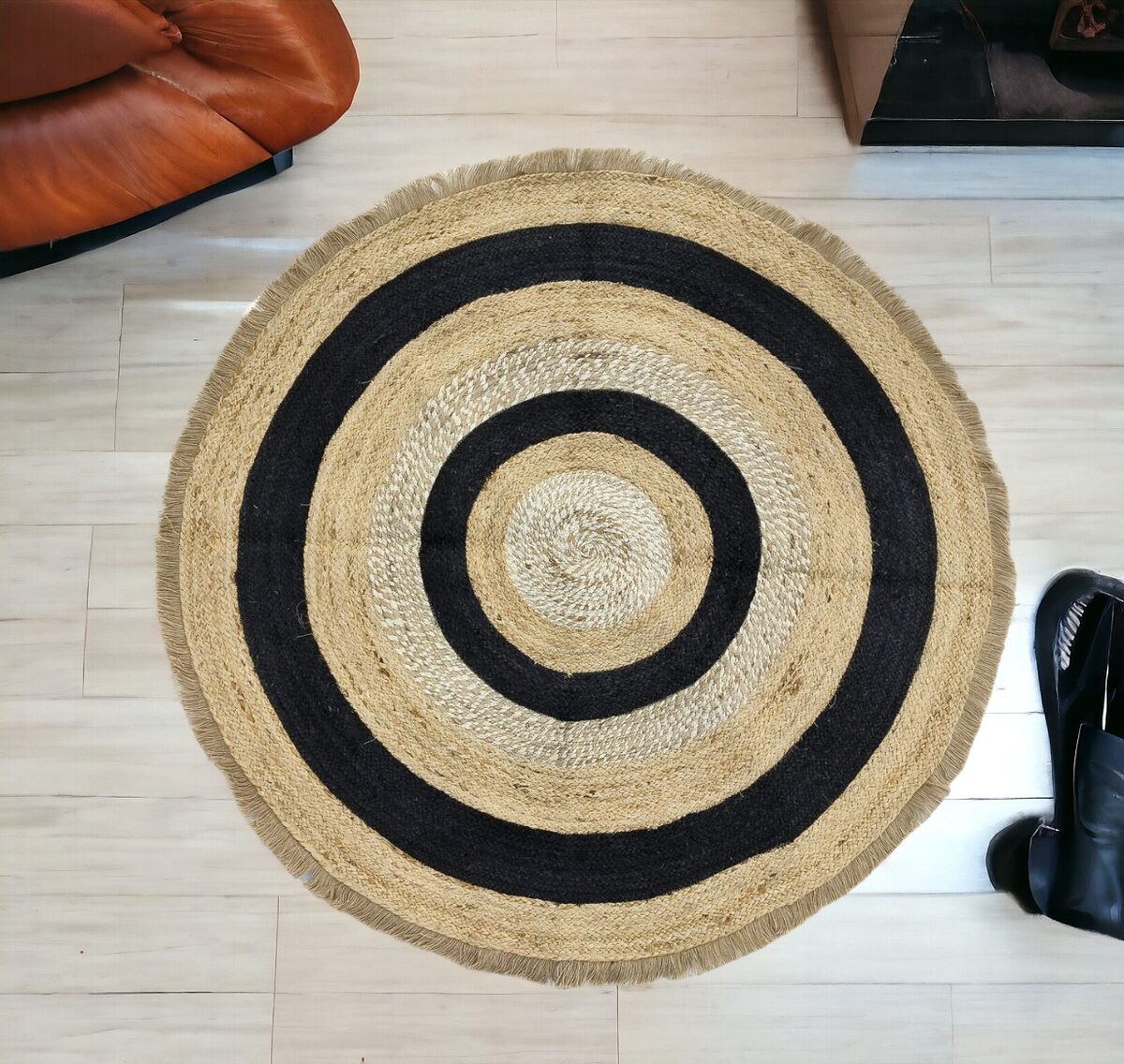 Round braided jute rug with black rings